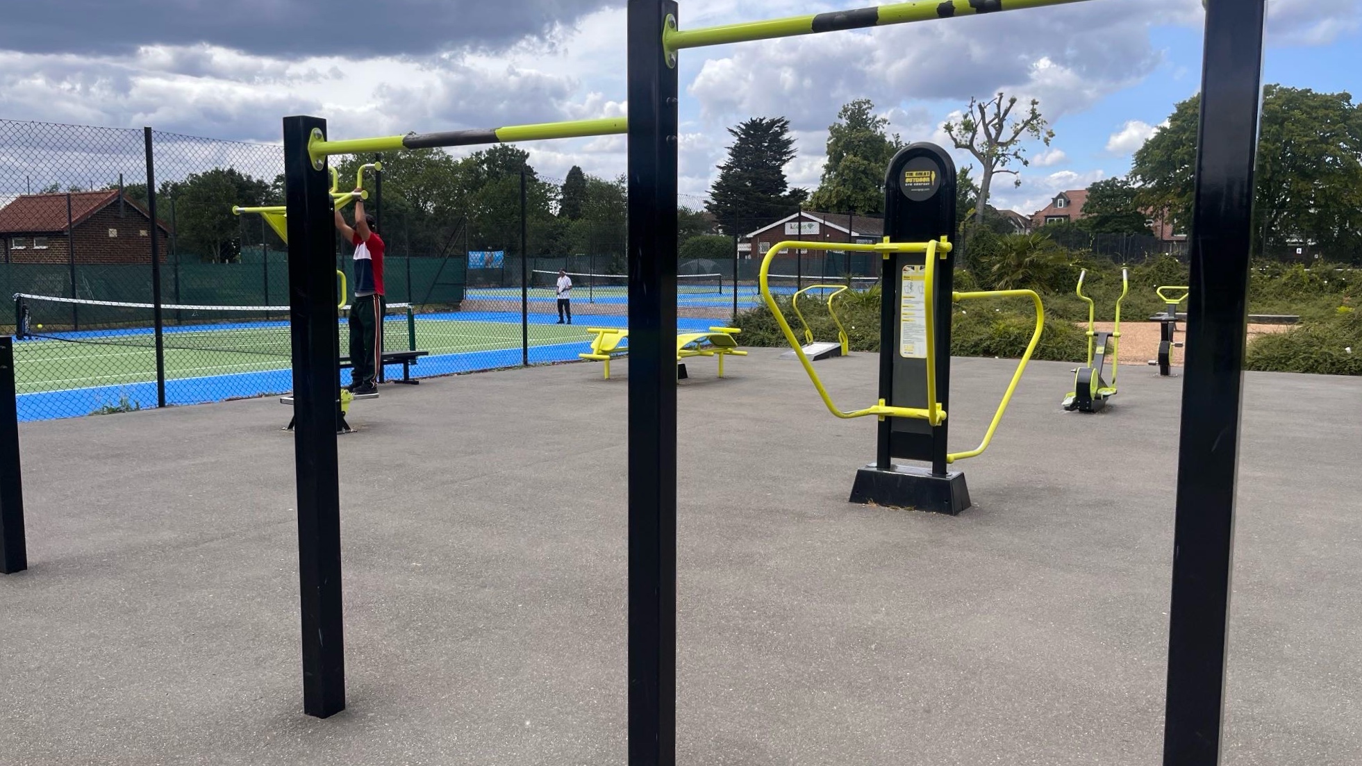 Outdoor gym equipment featuring pull-up and dip bars at Valentines Park Ilford for bodyweight training